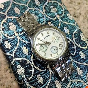 Michael Kors women's ritz silver watch (used)